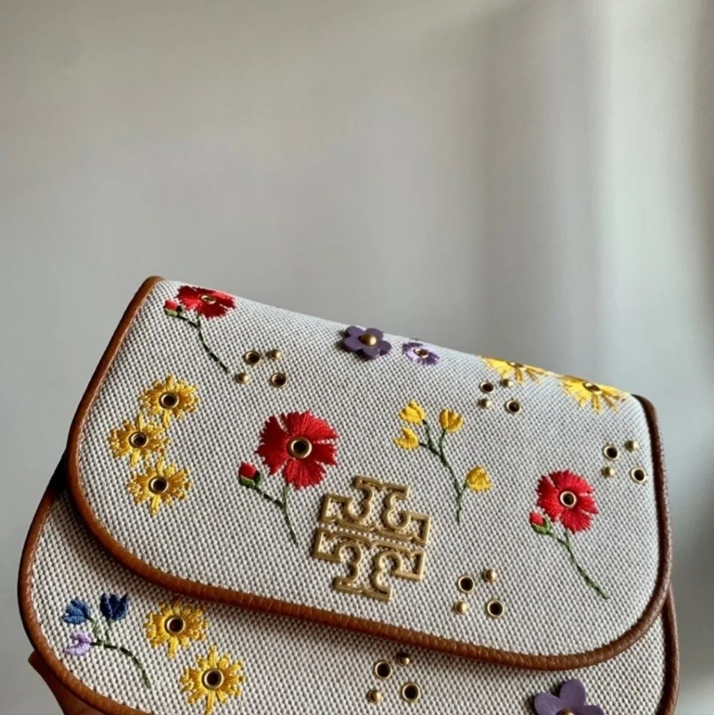 Tory Burch NWOTs Britten Floral Canvas Small Saddle Bag